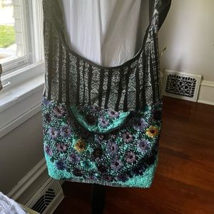 Embroidered shoulder bag purse.